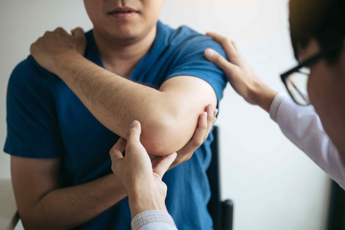 carpal tunnel syndrome checking patient elbow, shoulder