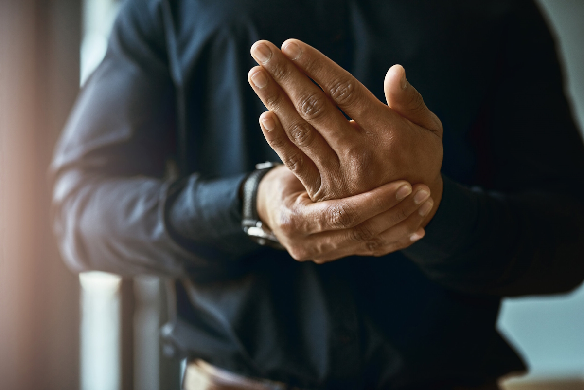 hand ligament injury pain in his hands