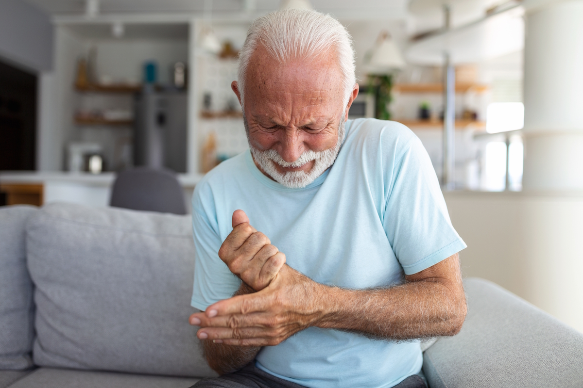 thumb arthritis surgery older man has pain in thumb