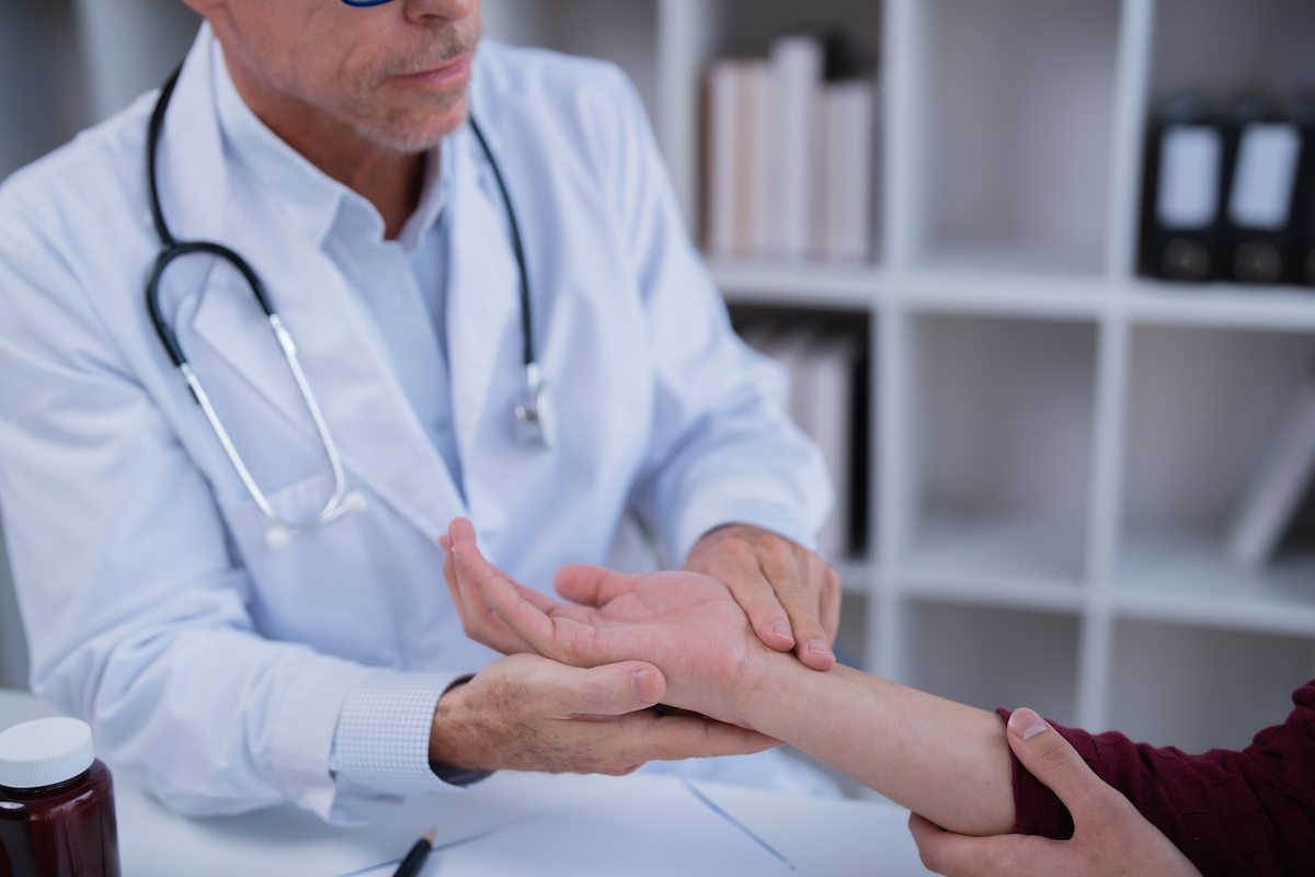 wrist fracture surgery doctor exam patient wrist after surgery recovery